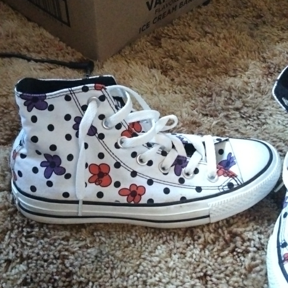 White converse with purple and orange flowers